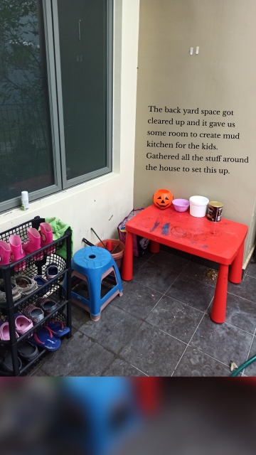 The back yard space got cleared up and it gave us some room to create mud kitchen for the kids. Gathered all the stuff around the house to set this up.